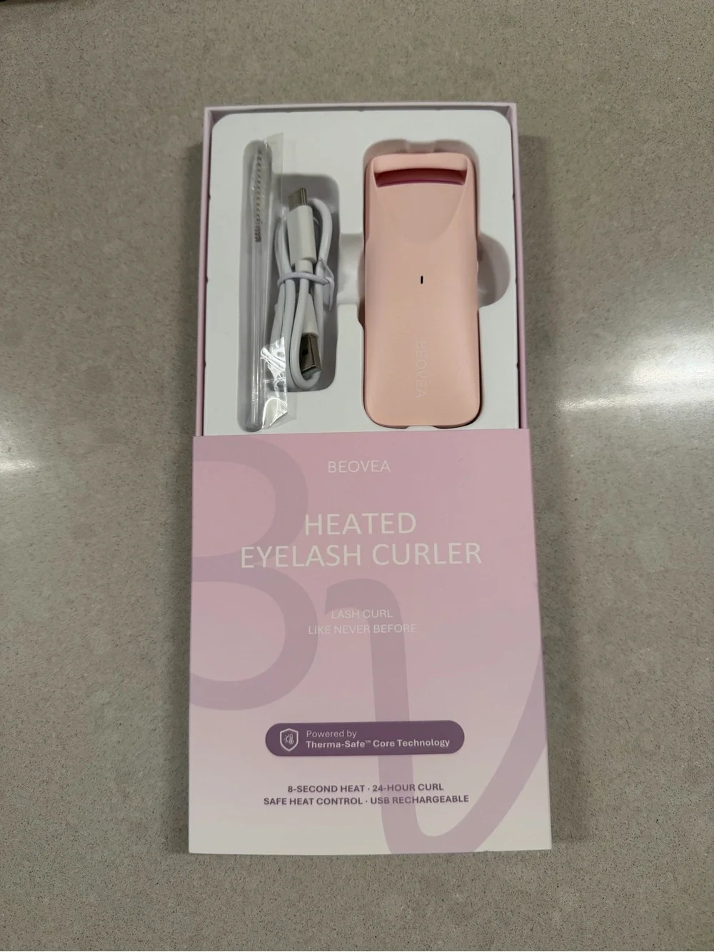 Heated eyelash curler